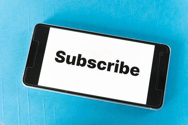 Phone with the word subscribe on it